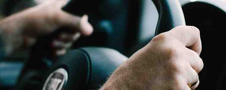 hands on a steering wheel