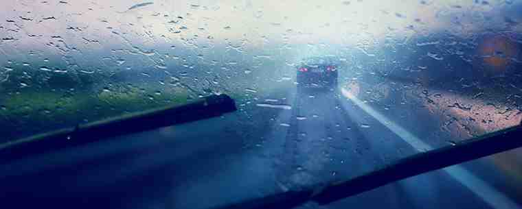 Car driving on wet road