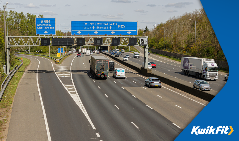 A busy UK motorway with cars and lorries driving north and south.