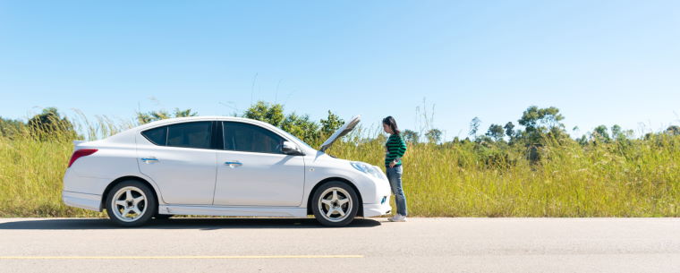 Broken down car at the side of a road