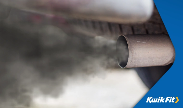 Close up of vapour & fumes leaving a car exhaust.