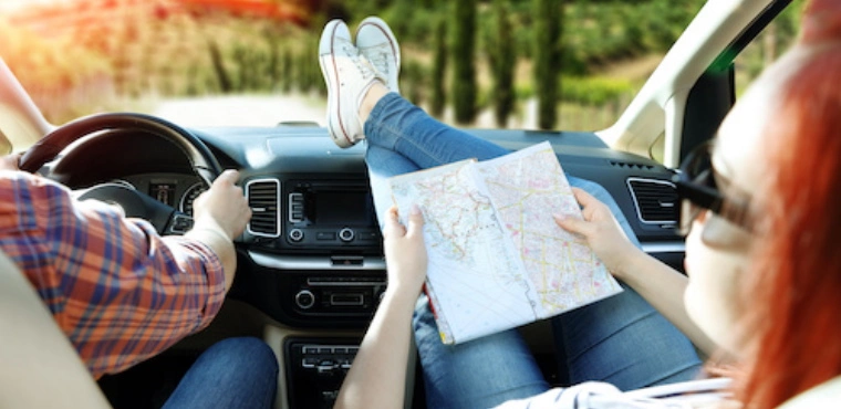 Woman with feet on dashboard in a car