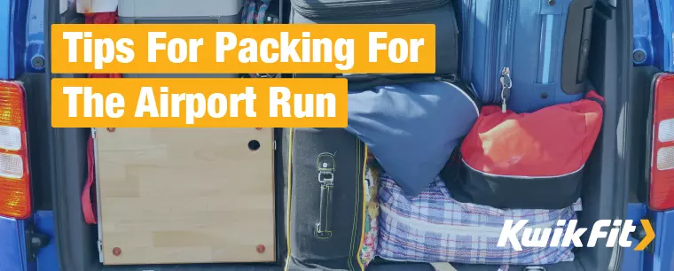 A car boot packed with luggage for a long holiday.